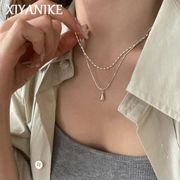 XIYANIKE Minimalist double layer water drop pendant necklaceAzizaK