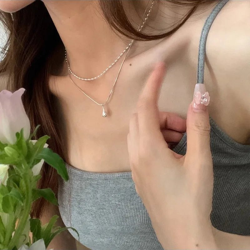 XIYANIKE Minimalist double layer water drop pendant necklaceAzizaK