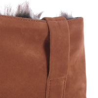 knee length boots, reversible inner fur, on the boot by means of a zipper