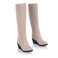 knee length boots, reversible inner fur, on the boot by means of a zipper