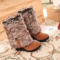 knee length boots, reversible inner fur, on the boot by means of a zipper