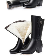 Calf - high boots fully lined with leather and zip fasteningAzizaK