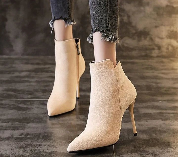 Heeled ankle bootsAzizaK