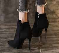 Heeled ankle bootsAzizaK