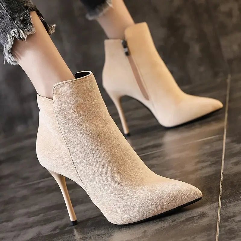 Heeled ankle bootsAzizaK