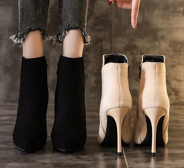 Heeled ankle bootsAzizaK