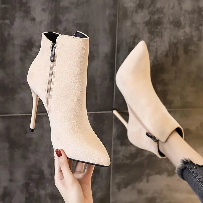 Heeled ankle bootsAzizaK