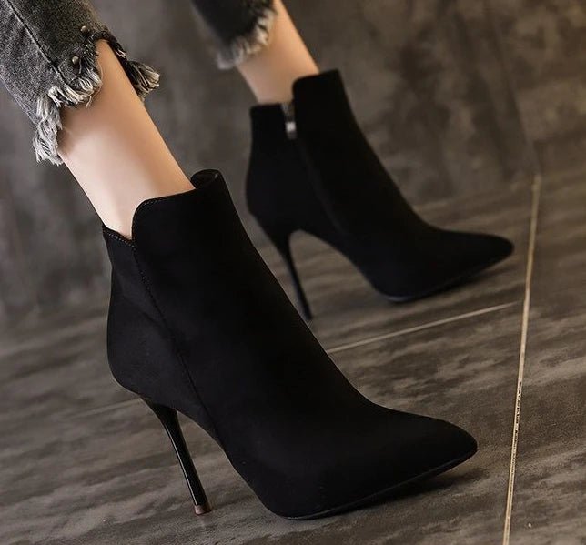 Heeled ankle bootsAzizaK