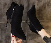 Heeled ankle bootsAzizaK