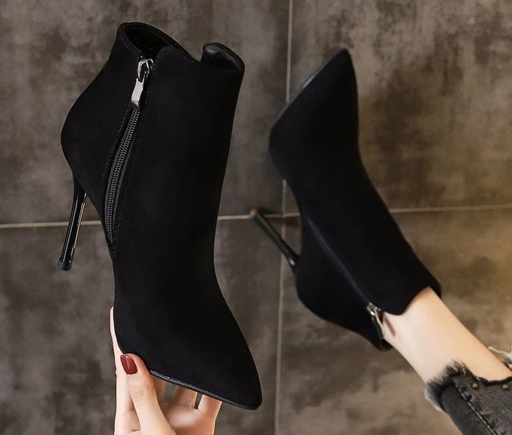 Heeled ankle bootsAzizaK