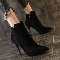 Heeled ankle bootsAzizaK