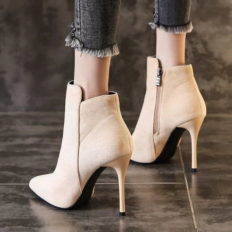 Heeled ankle bootsAzizaK