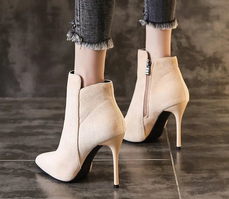 Heeled ankle bootsAzizaK