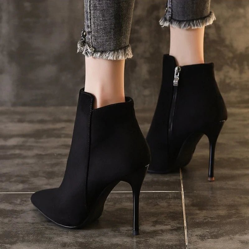 Heeled ankle bootsAzizaK